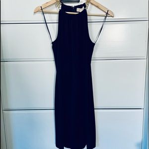 Navy mini dress with gold chain detail